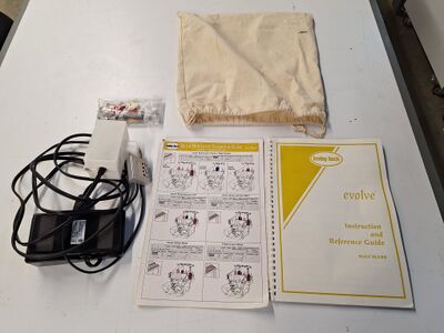 Coverstitch instructions, tools, foot pedal, and storage bag.